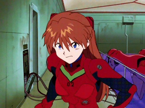 Asuka insultando a Shinji por no subirse en el robot. Asuka siendo tsundere